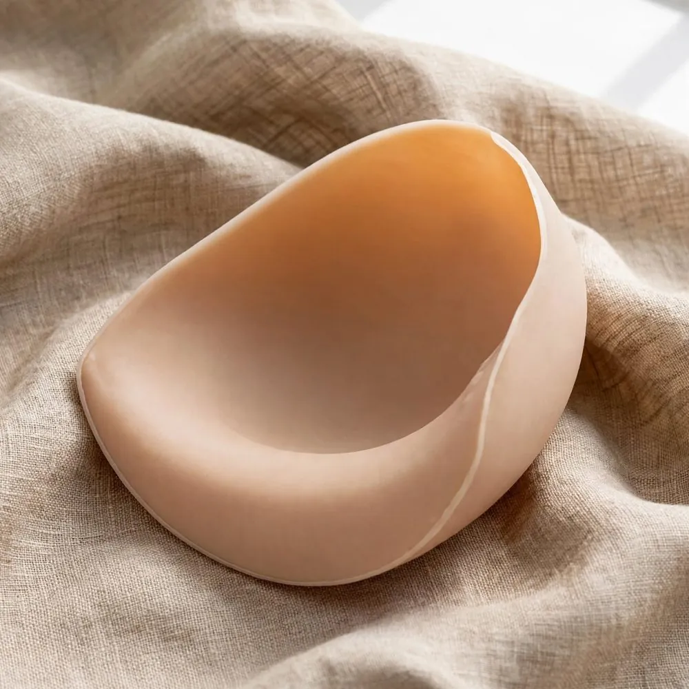 A silicone shell form with a deep hollow back