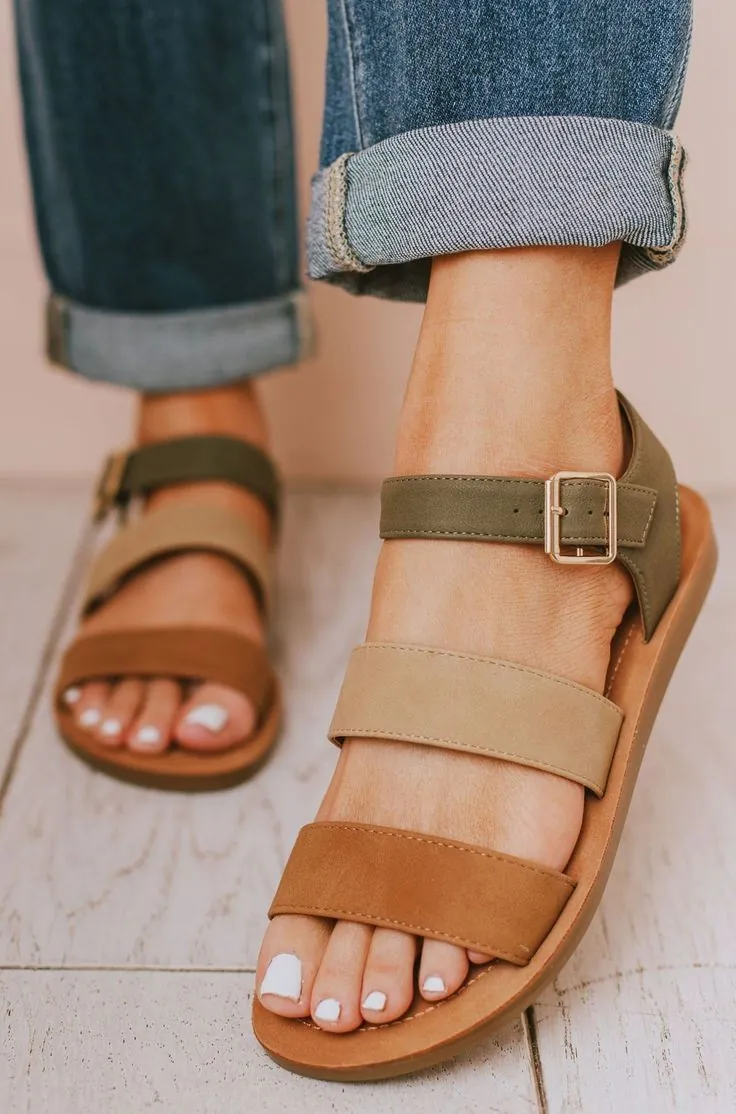 Cream ballet flats worn with linen trousers