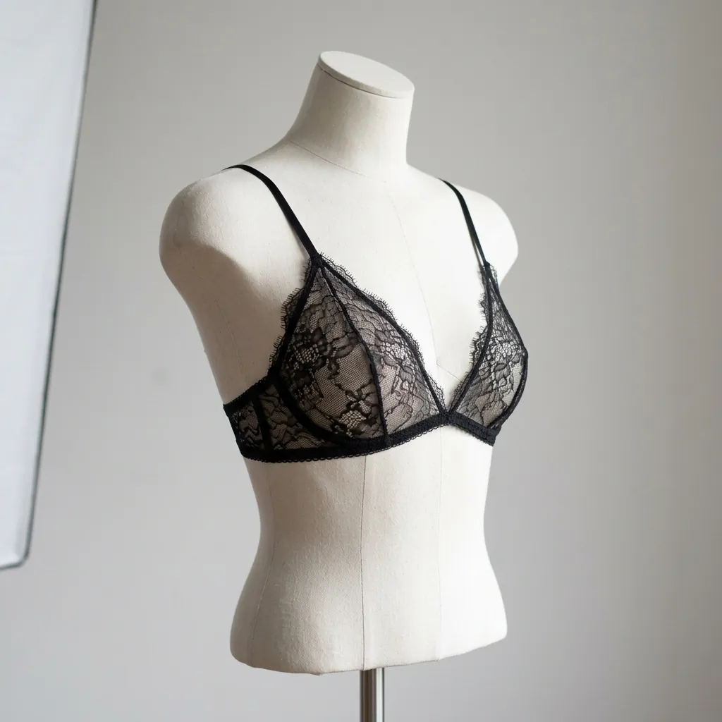 A thin bralette, which does not hold breast forms well